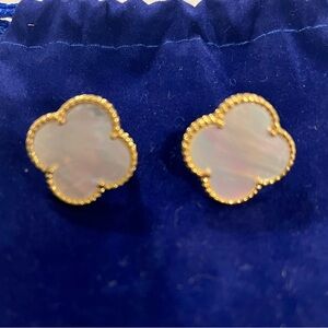 New pierced earrings, never worn. Style similar to Van Cleef Alhambra.